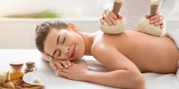 A woman getting a sports massage near me